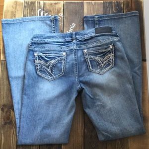 Used Twenty One Black by RUE 21. Size 5/6R FLARE.